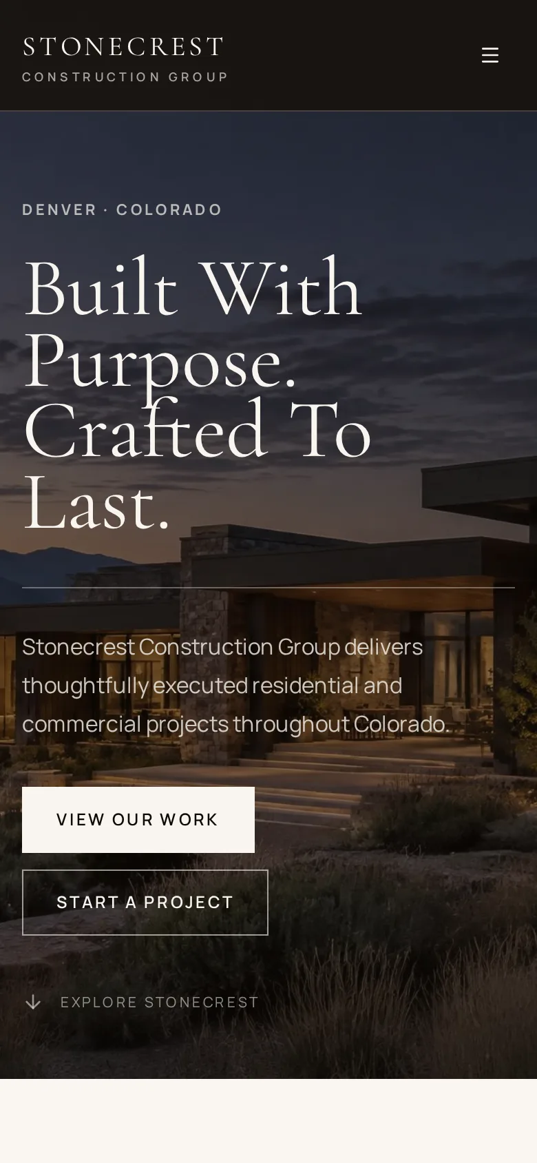 Stonecrest Construction website shown on a mobile phone